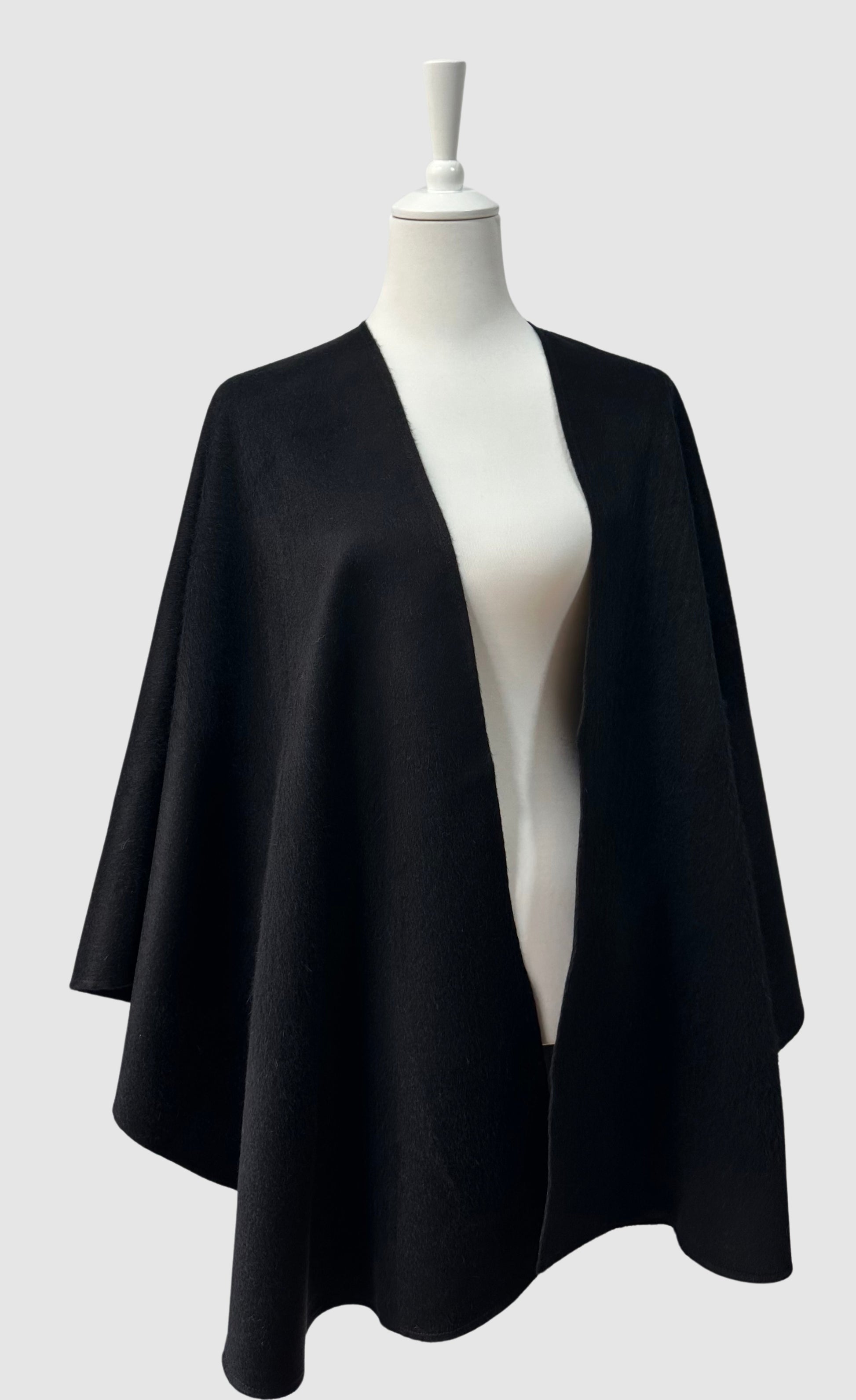 Black baby alpaca cape made in Peru. One size.