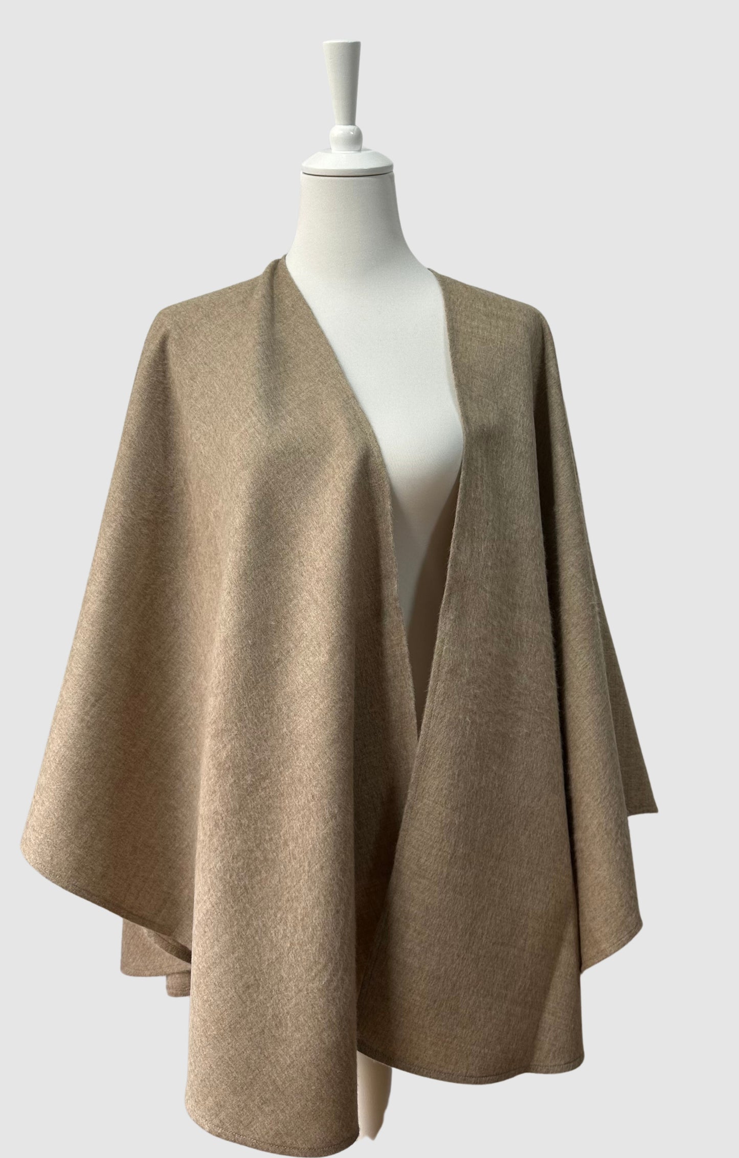 Brown baby alpaca cape made in Peru. One size.