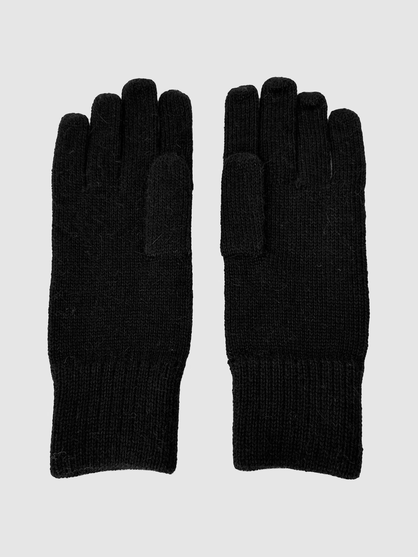 Black baby alpaca gloves made in Peru. One size.