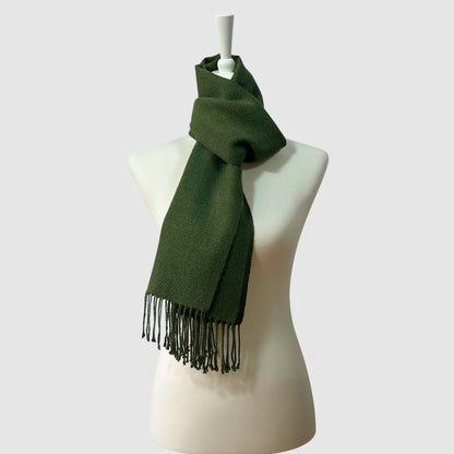 Hand-knitted solid green baby alpaca scarf. Measures 180 cm in length by 30 cm in width.