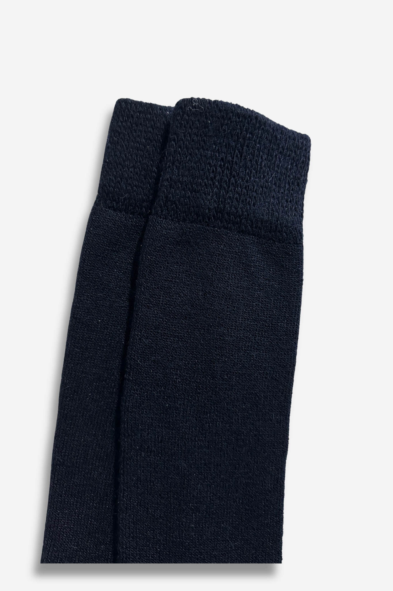 Calcetines azules largos de alpaca para hombre y mujer, ideales para mantener los pies cálidos y cómodos en invierno.