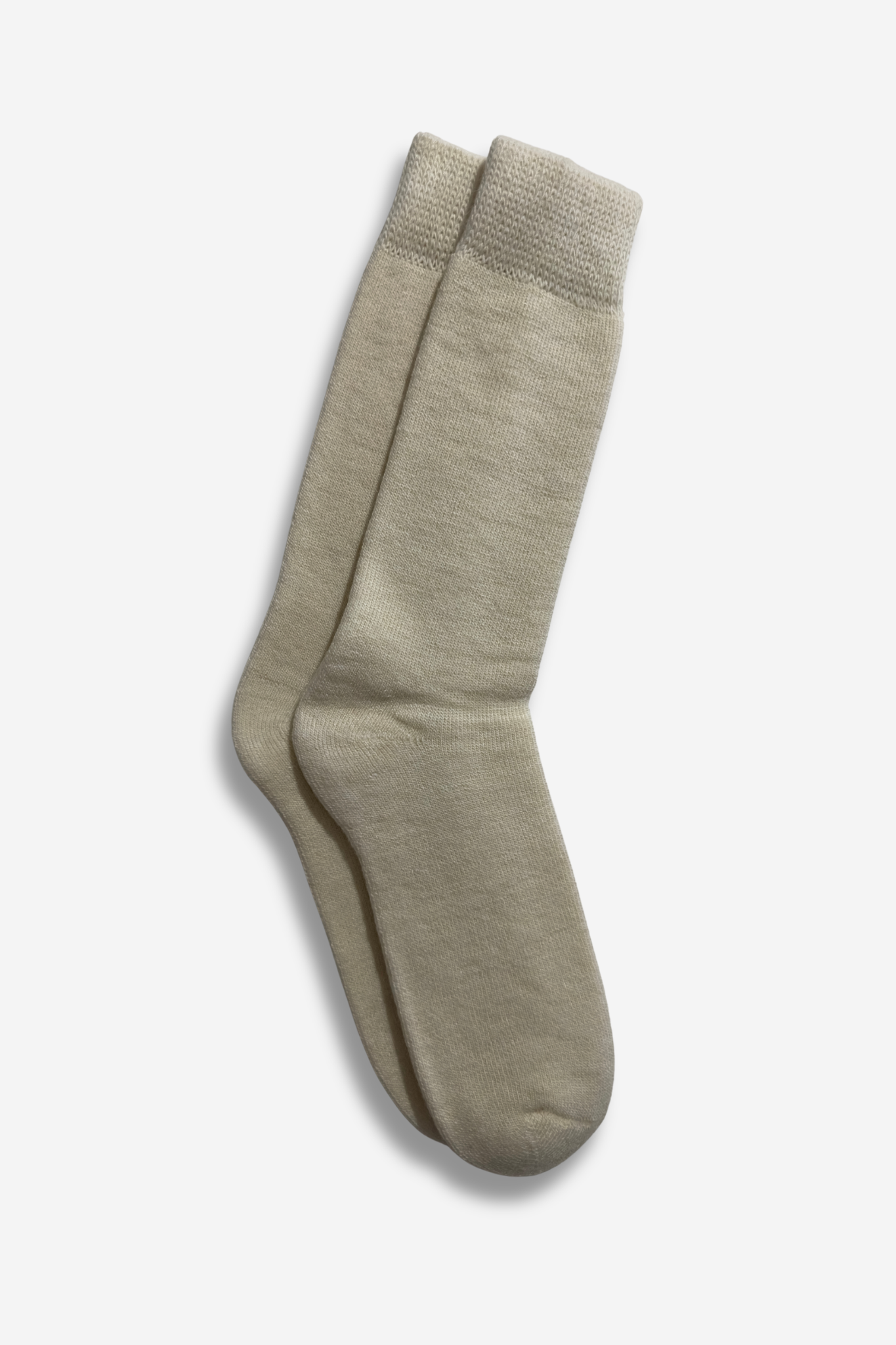 Cream fuzzy alpaca wool socks with a soft plush texture, designed for men and women with natural warmth and breathable everyday comfort.