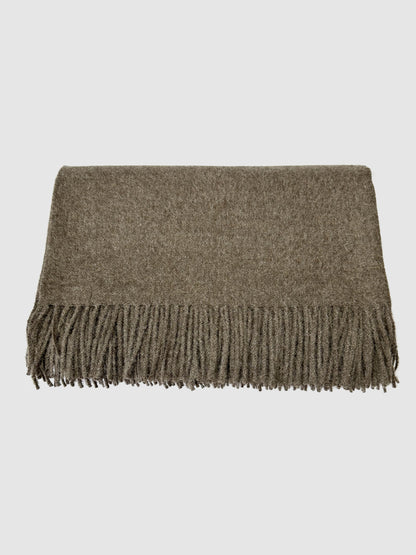Cozy dark brown alpaca blanket for sofa and bed, perfect warm and stylish winter blanket for home comfort.