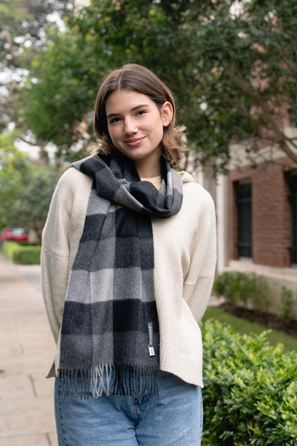 Soft and stylish grey plaid scarf for women. A cozy plaid winter scarf that blends warmth, elegance, and timeless winter fashion.