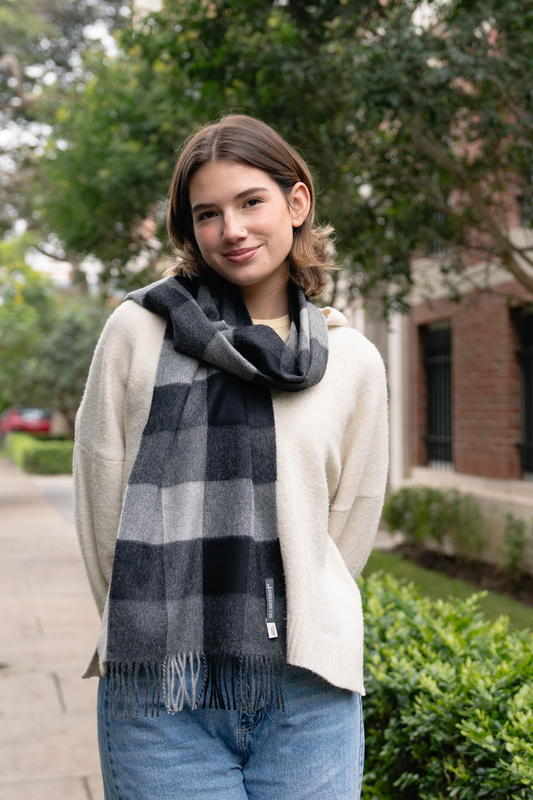 Soft and stylish grey plaid scarf for women. A cozy plaid winter scarf that blends warmth, elegance, and timeless winter fashion.