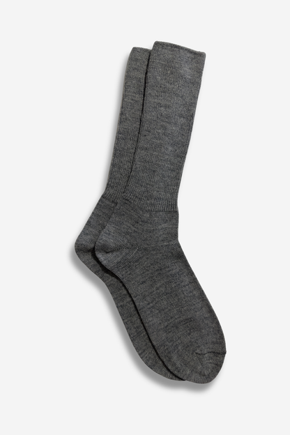 Grey ribbed alpaca socks made from premium baby alpaca wool, designed for women and men with soft, breathable warmth and everyday comfort.